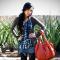 Sharrae is wearing the monet tunic by Collective Clothing and carrying the knotted hobo by Melie Bianco for bellamaven.com