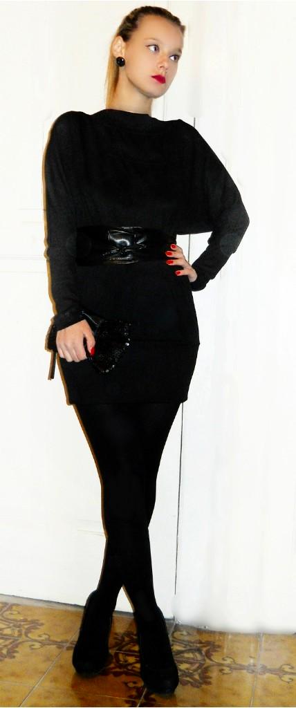 black dress , a pony tail and red lips